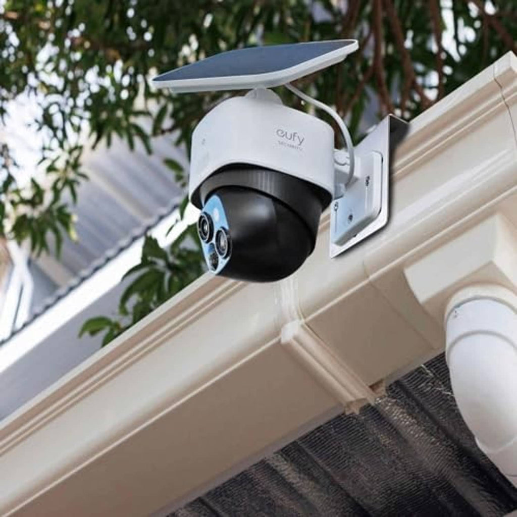 Stainless steel gutter camera mount bracket holding a white dome security camera