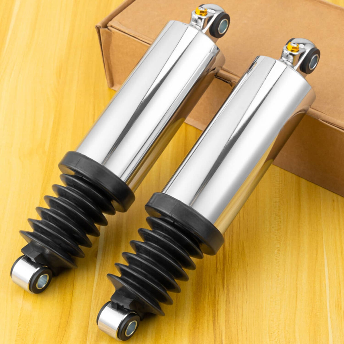 Chrome air suspension shocks with black spring covers and mounting pins