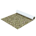 Green speckled EVA foam boat decking sheet mat, with rolled backing edge visible.