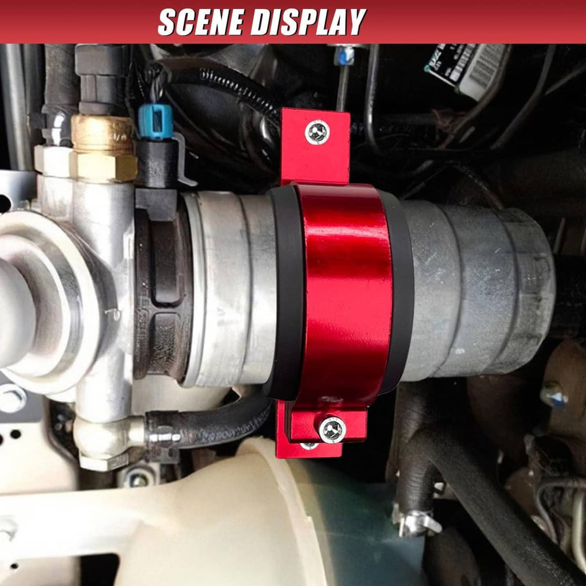 Red fuel filter clamp bracket secured around a fuel component with black rubber insert