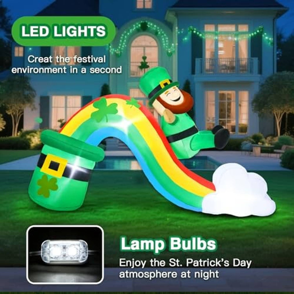 LED-lit inflatable rainbow slide with leprechaun, green clover pot, and white cloud landing