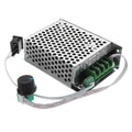 DC motor speed controller power module with perforated metal casing and green terminal blocks