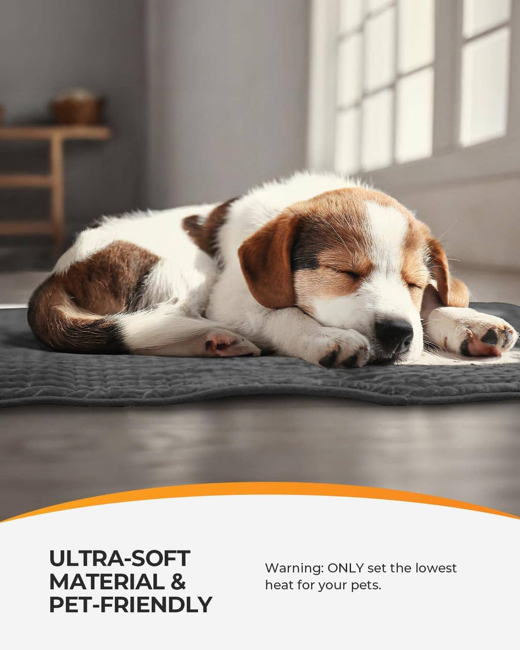 Gray heating pad with a sleeping pet resting on top.