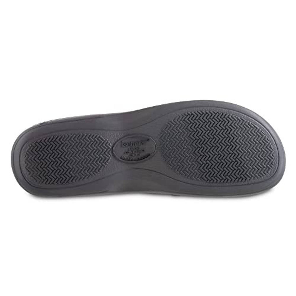 Slipper outsole with textured tread pattern for traction