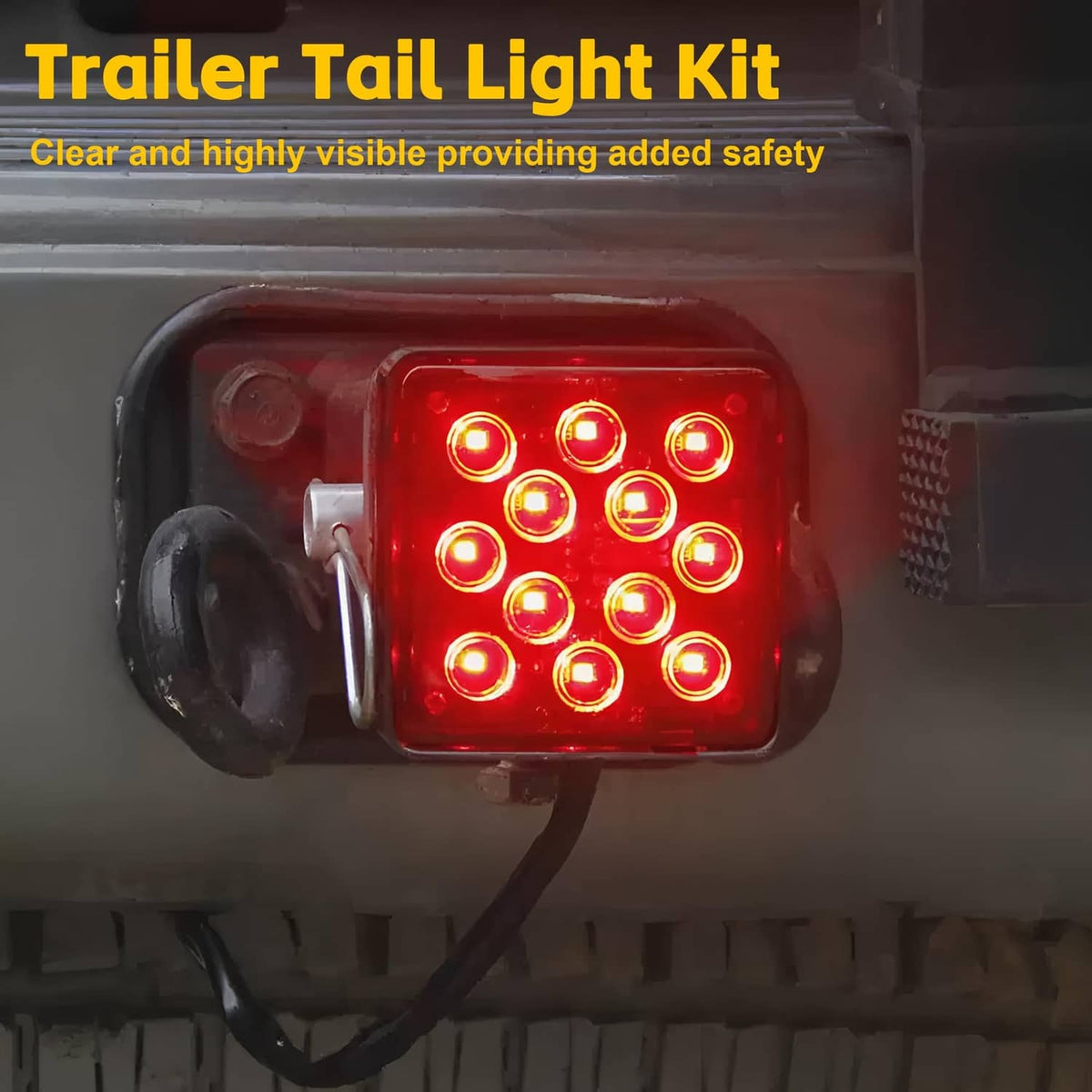 Black trailer hitch cover brake light with red glowing 12 LEDs and mounting bracket