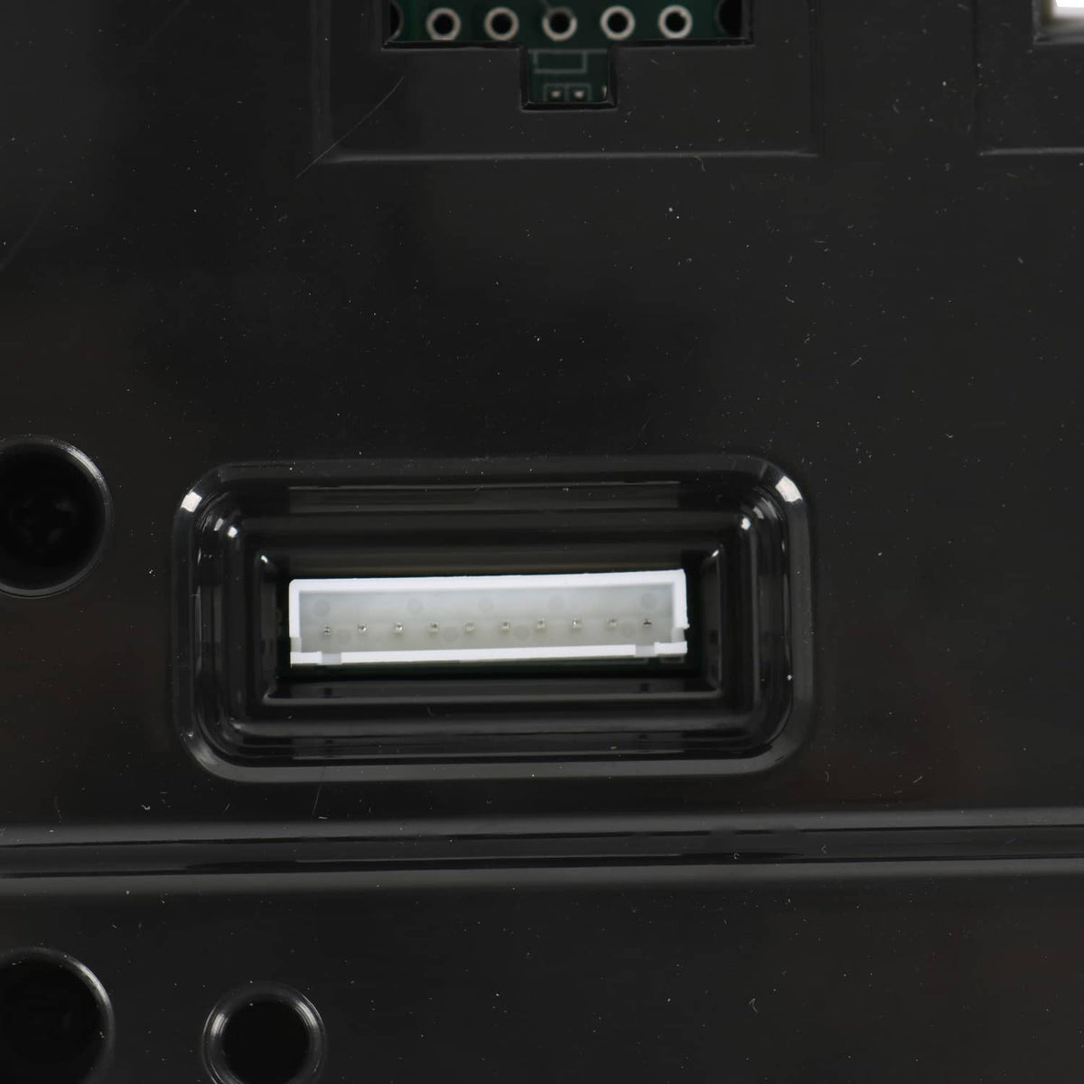 Black controller assembly close-up of internal ribbon connector terminal