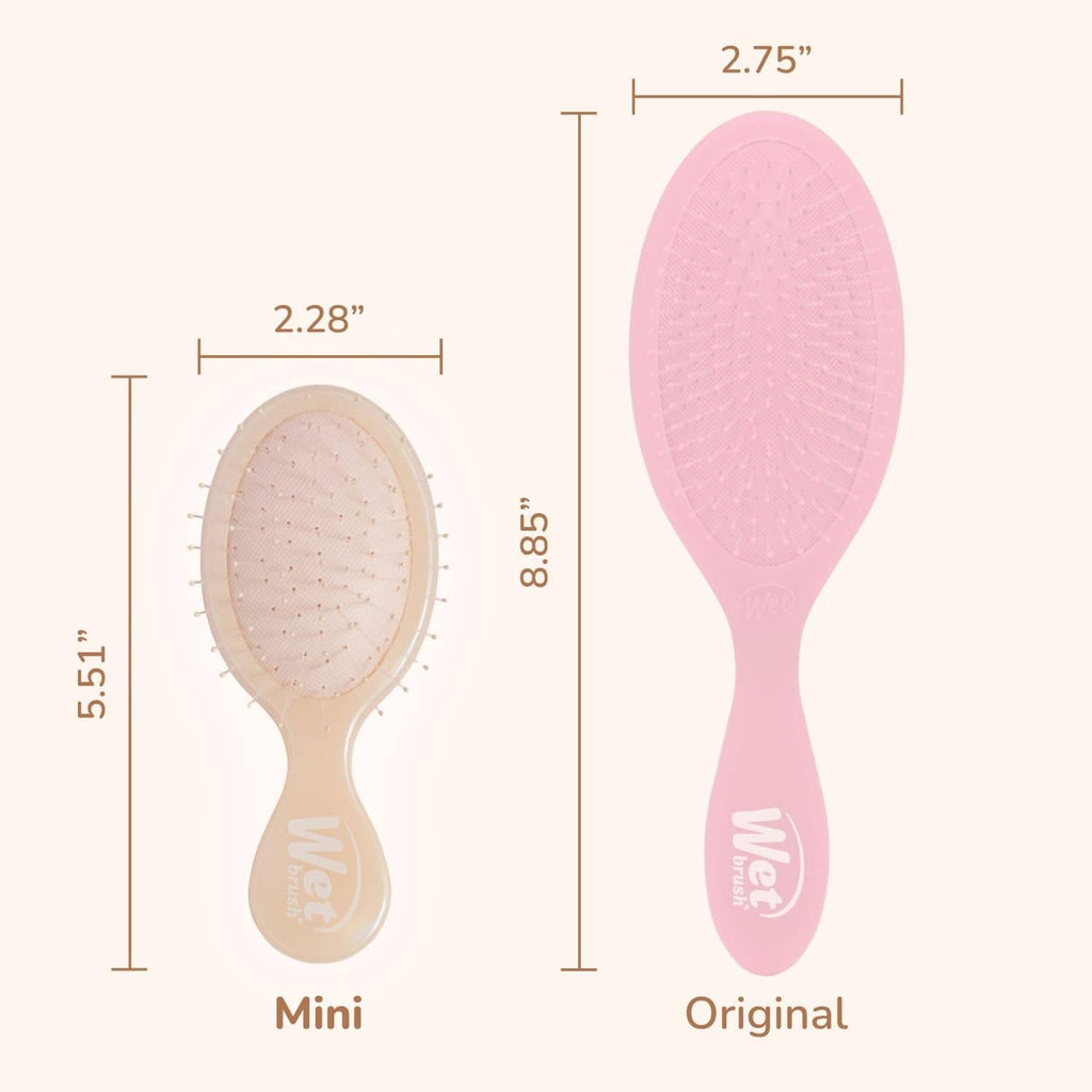 Translucent beige mini detangling hair brush with short bristles and curved handle