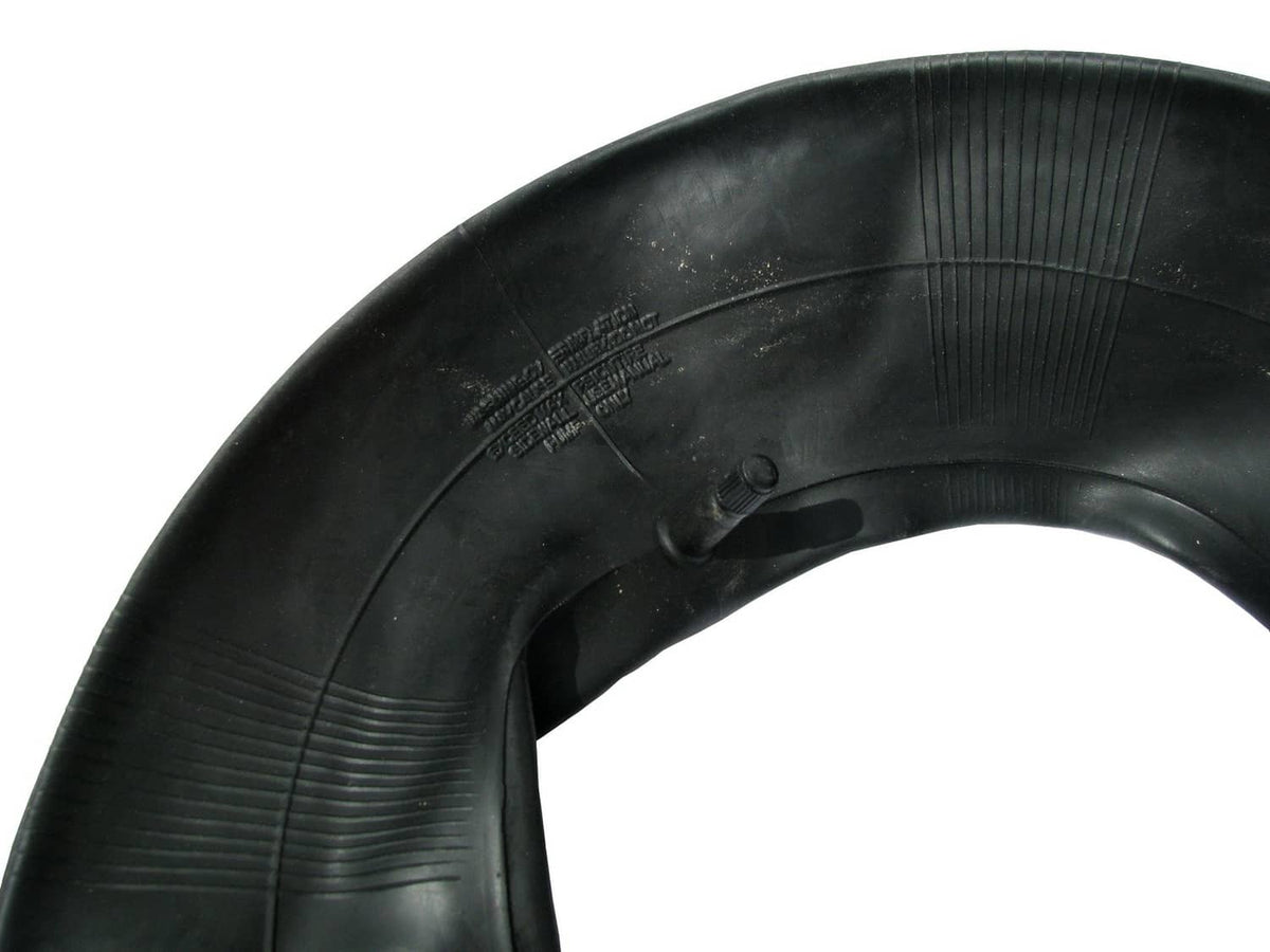 Angle view of black inner tube showing valve area and ribbed texture