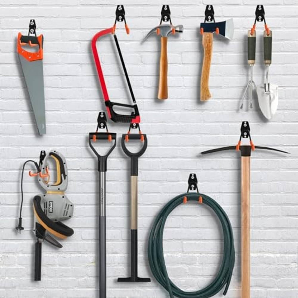 Wall organizer hooks on a pegboard-style layout, featuring black brackets and orange rubber tips