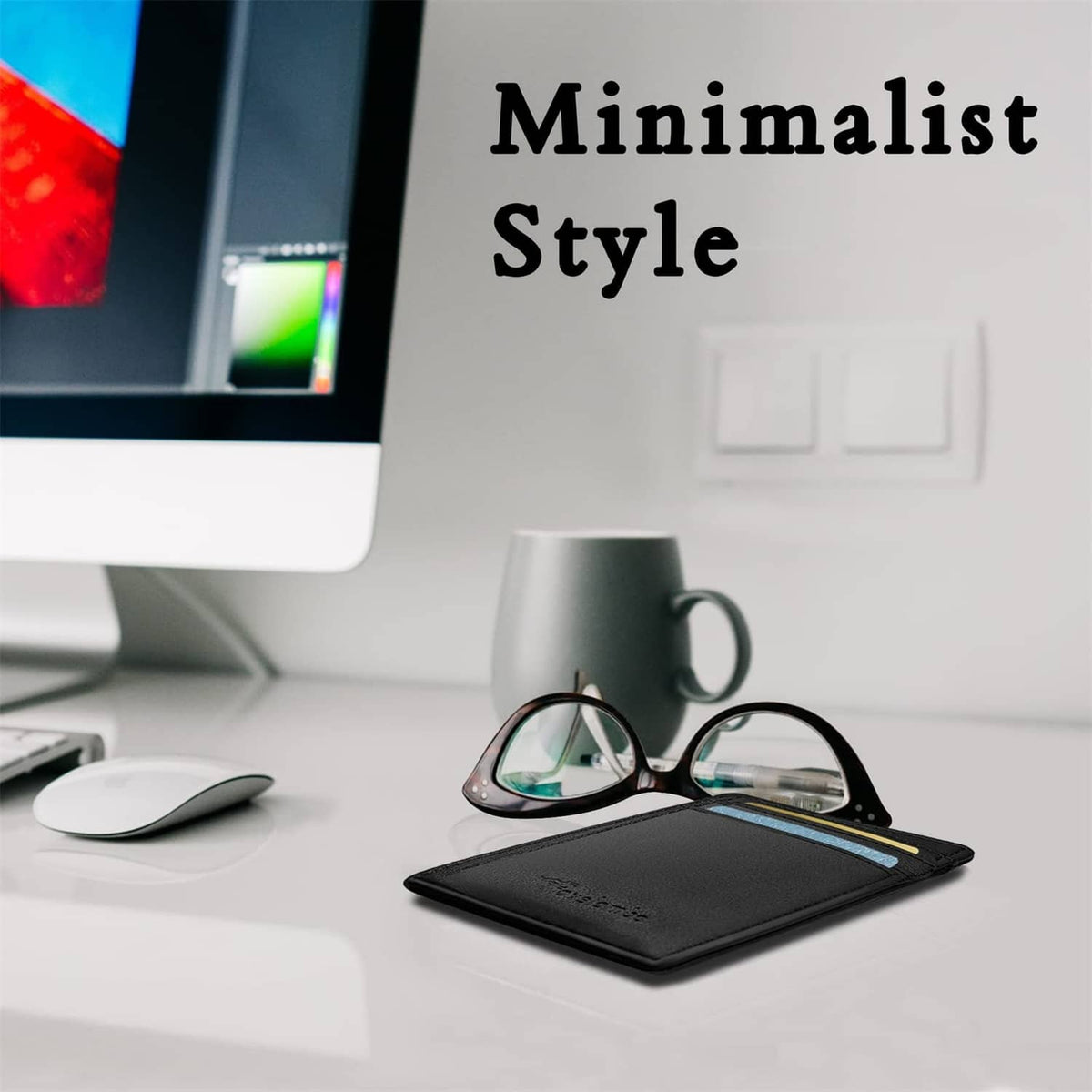 Black slim leather wallet with front card slots, shown on a desk
