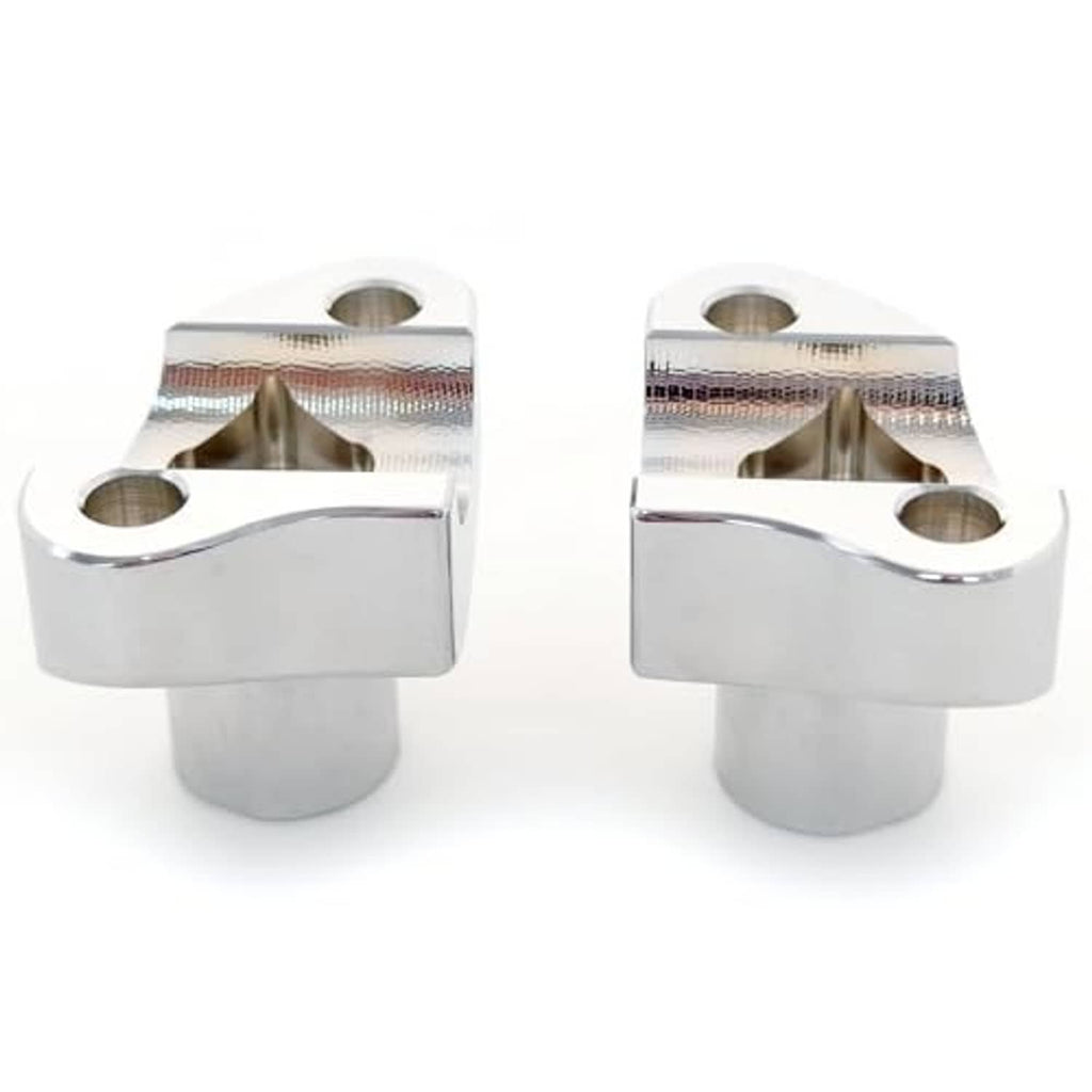 Chrome handlebar riser blocks with top bolt holes and polished side mounting faces