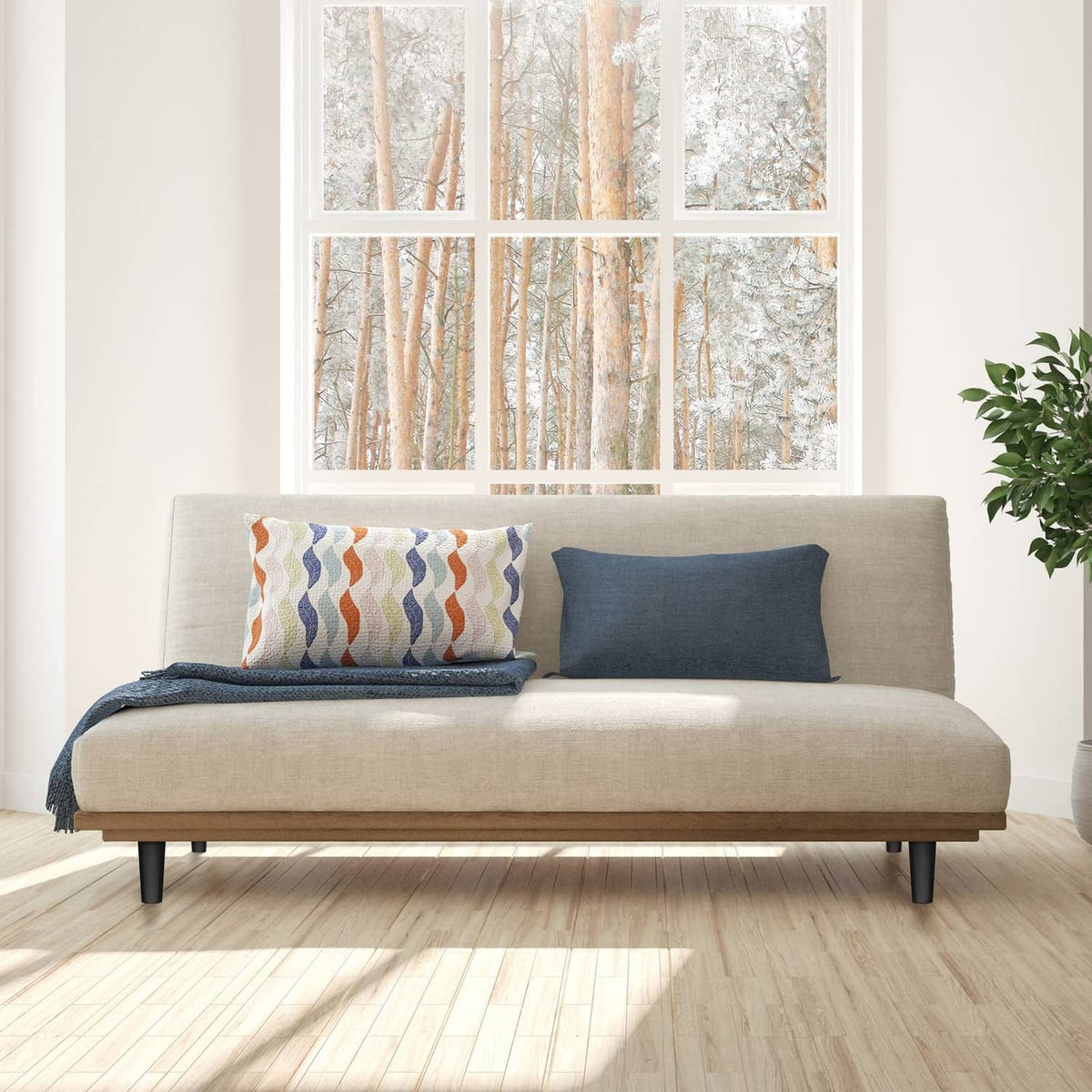 Black plastic furniture legs under a beige sofa