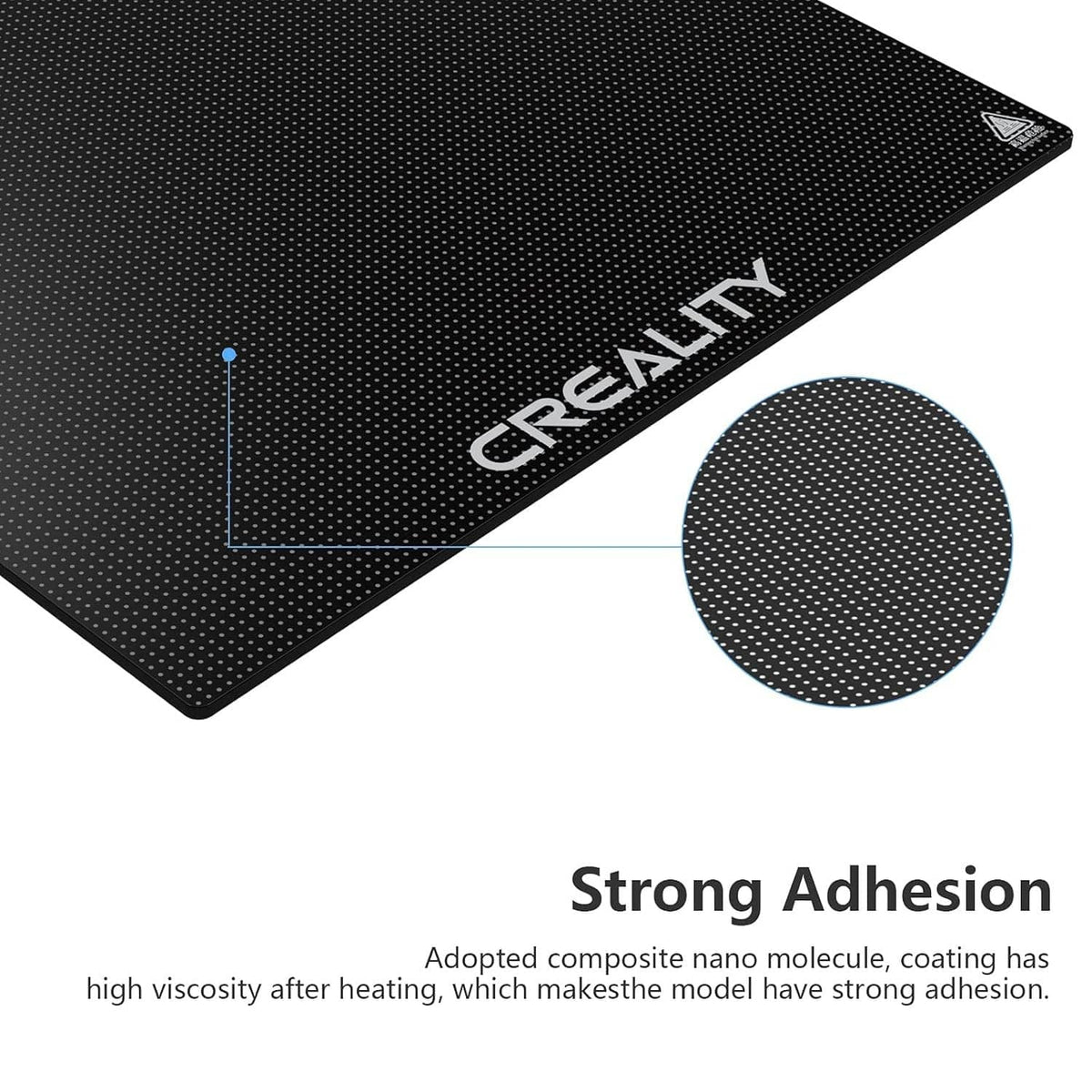Creality 3D printer glass bed platform, dark dotted surface close-up