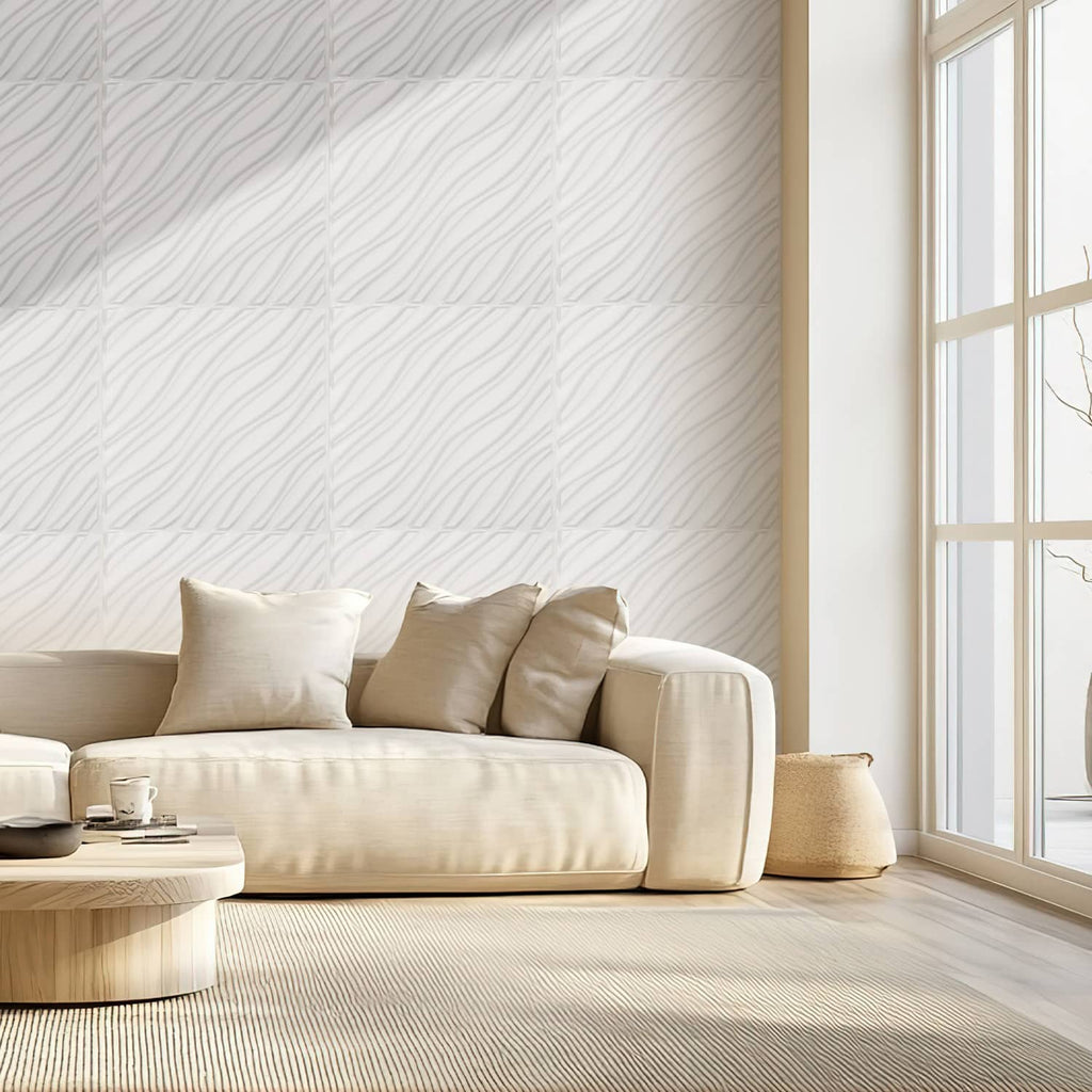 Matte white PVC 3D wave wall panel covering a room wall beside a sofa.