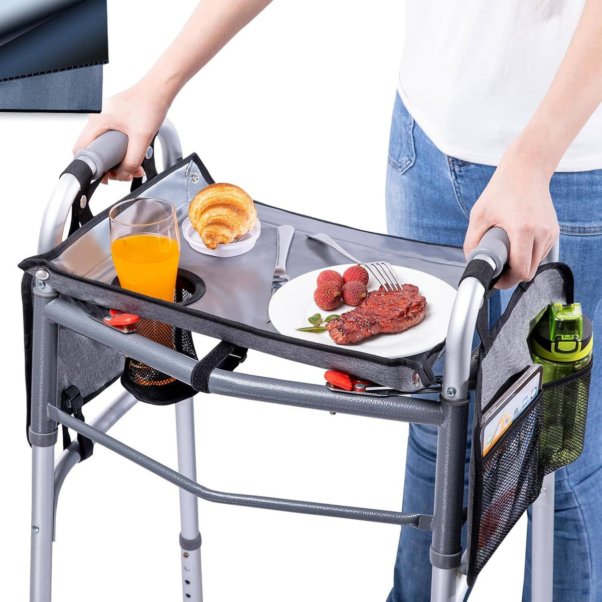 Folding walker tray table with cup holder and side pockets, snack and drink on top
