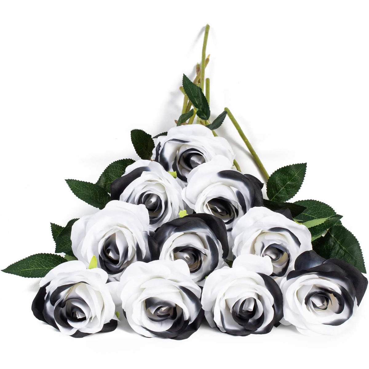 Artificial silk rose bouquet with white and black blooms and green leaves