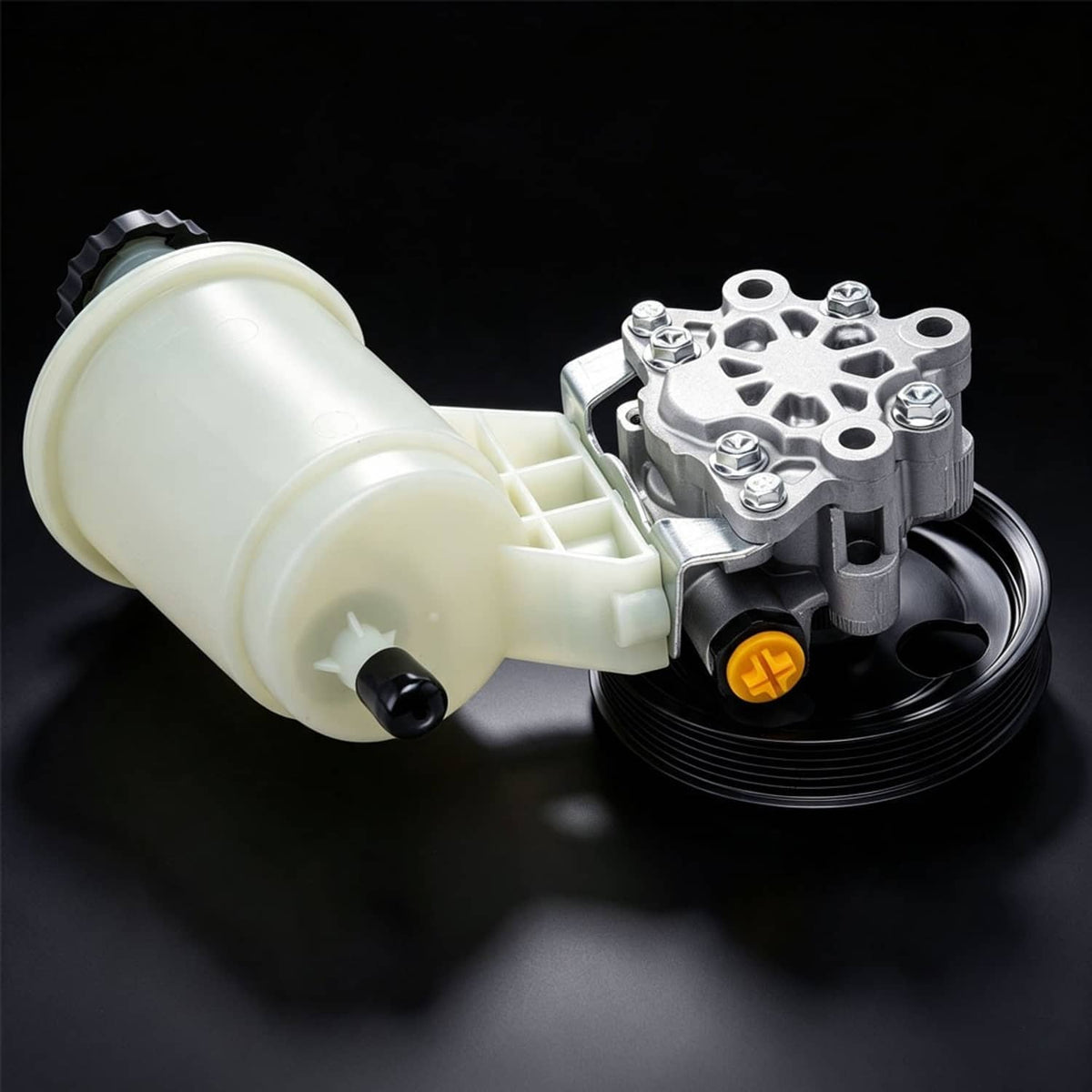 Power steering pump assembly with light reservoir, black pulley, and silver housing.