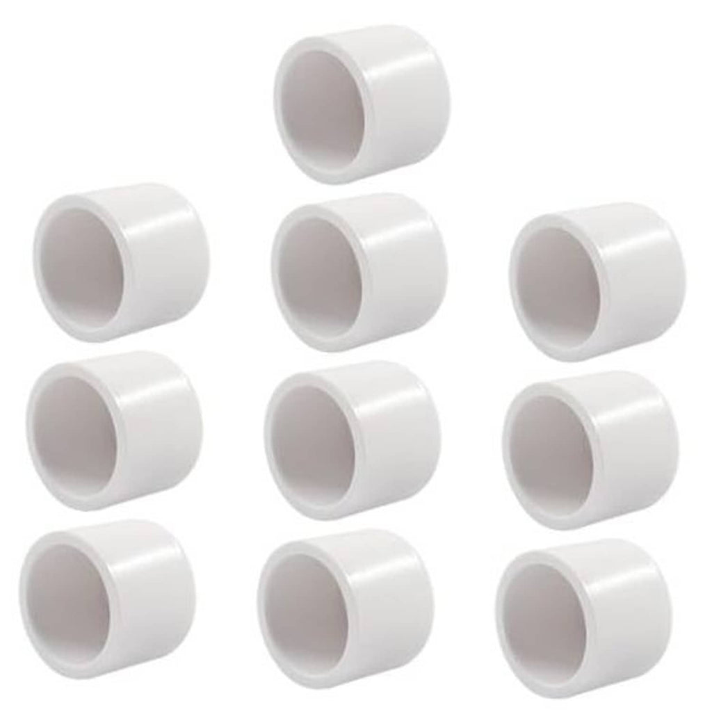 Set of white PVC pipe end caps, open cylindrical ends