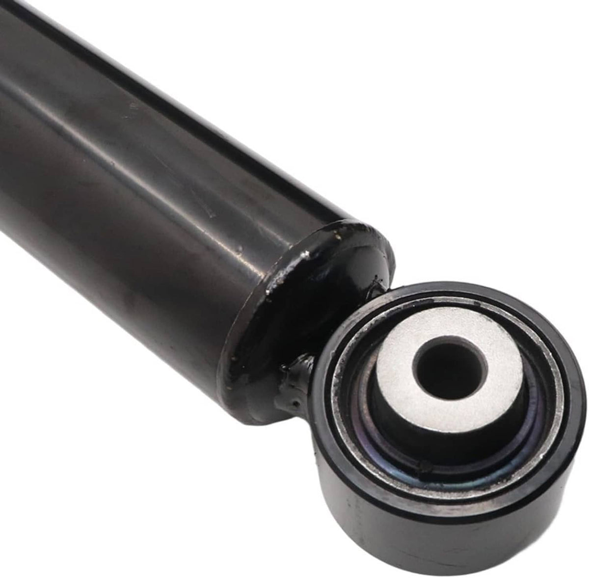Shock absorber bushing and seal detail on black rear strut