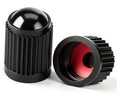 Set of black ribbed plastic tire valve stem caps with red O-ring inserts