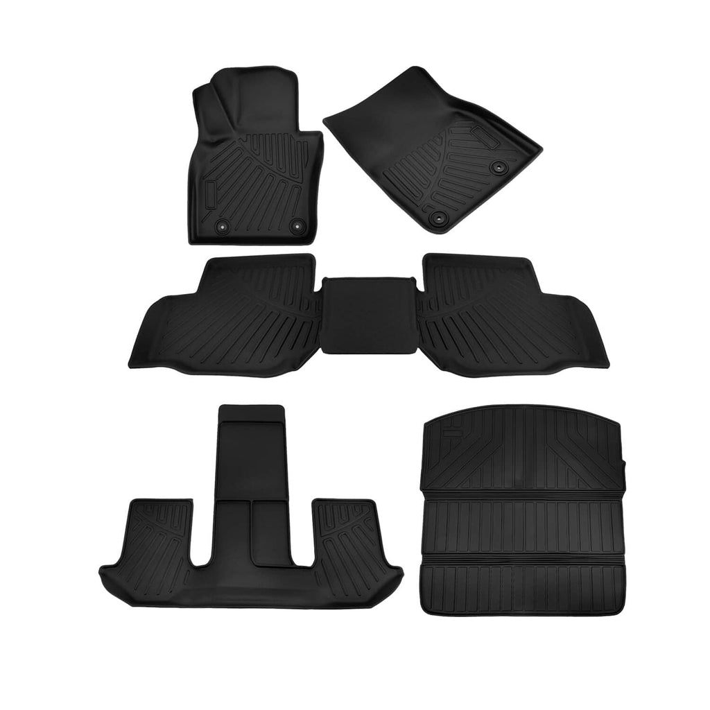 Black car floor mats and trunk liner, front and rear pieces with textured ridges