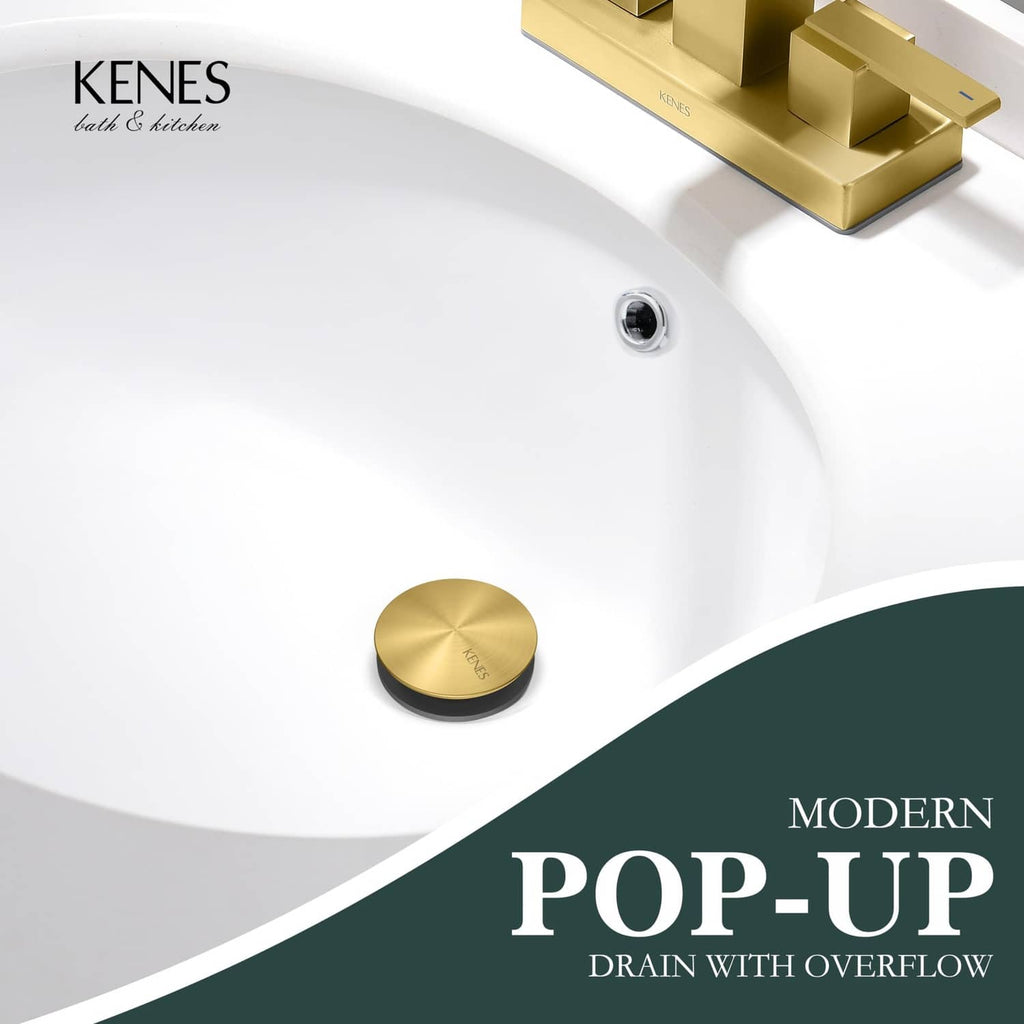 Bathroom sink pop-up drain cap with KENES logo in brushed gold