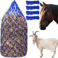 Blue mesh slow feeder hay net bag with hay, with horses nearby