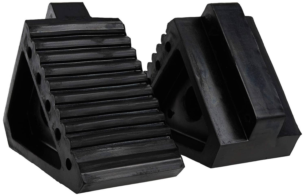 Black rubber wheel chocks set with ribbed tread and side drainage/bolt holes