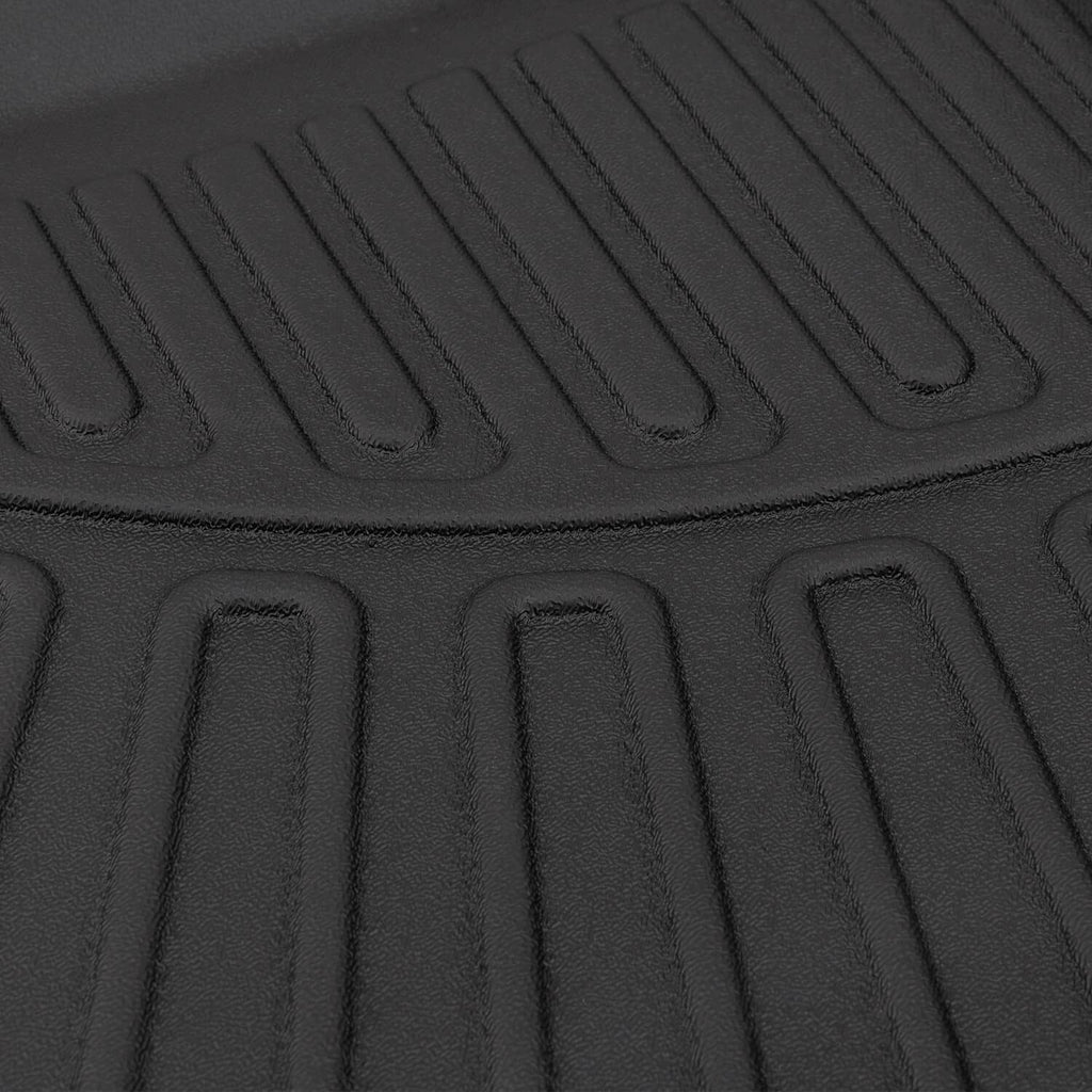 Black all-weather cargo liner with ribbed traction ridges and molded channel edges