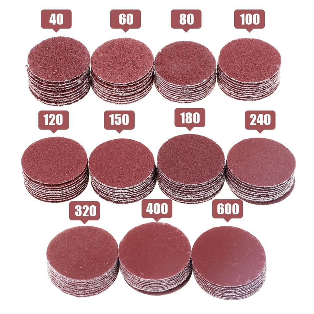 Assorted 1-inch brown sanding discs with grit labels 40–600
