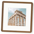 Square solid oak picture frame with rounded corners, holding a landscape photo.