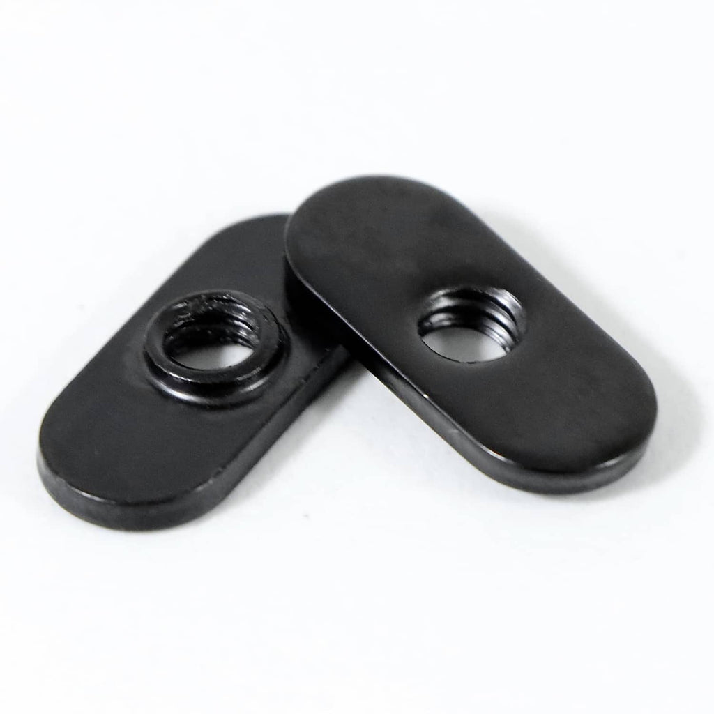 Black 1/4-20 centered slide T-nut pair, threaded holes visible