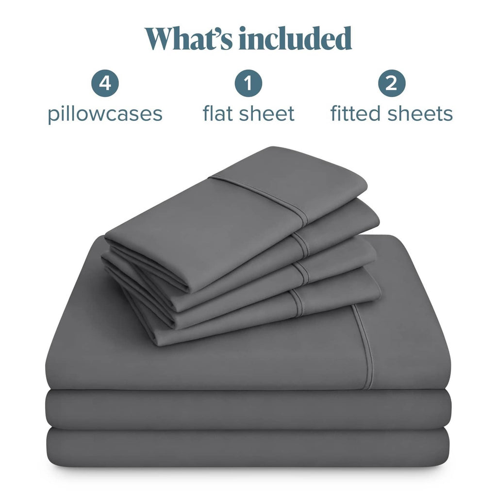 Stacked grey microfiber sheets set showing pillowcases, flat sheet, and fitted sheets