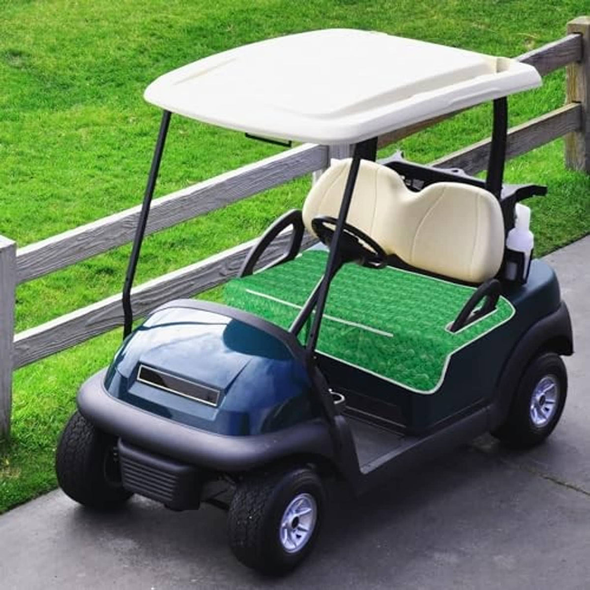 Green seat cover installed on a golf cart, textured pattern with white piping trim