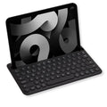 Compact black Bluetooth keyboard with 78-key layout and folding design