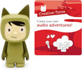 Green cat Tonie figurine standing beside red Creative-Tonie audio card
