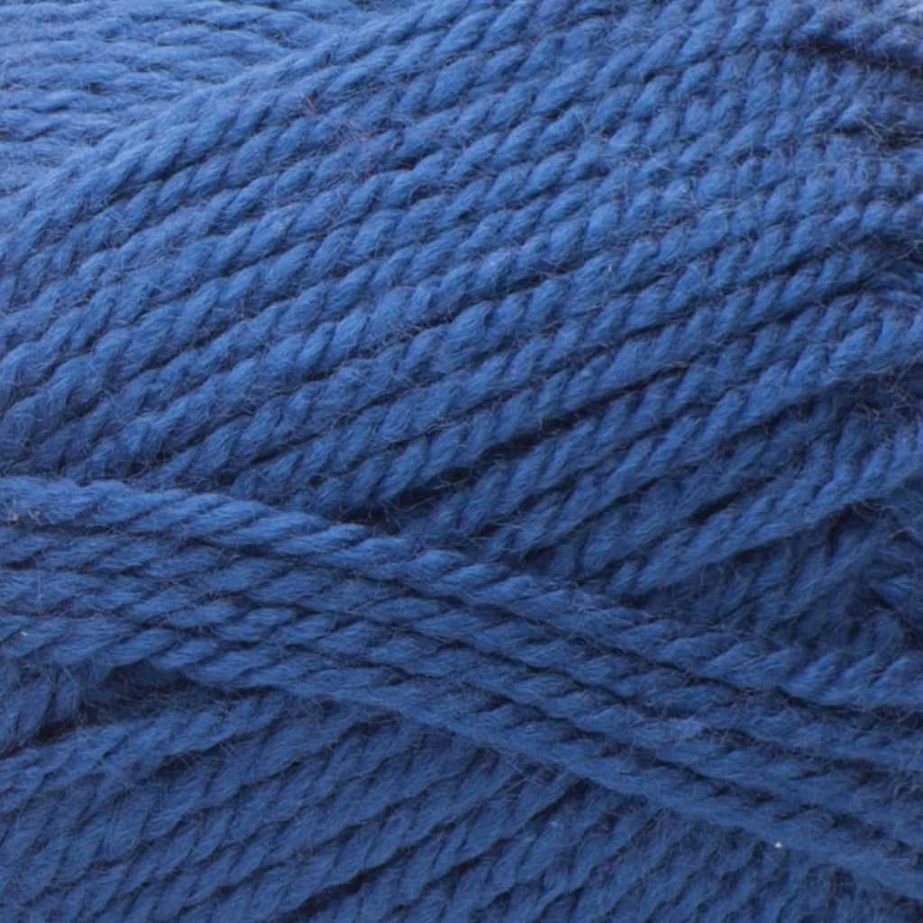 Close-up of blue acrylic yarn texture with twisted knit strands