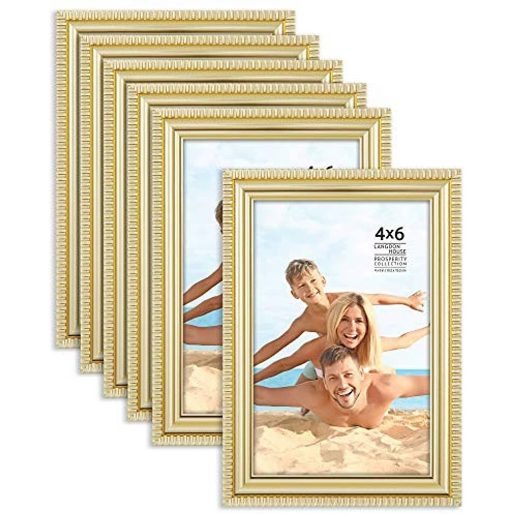 Gold ornate 4x6 picture frames, stack of four