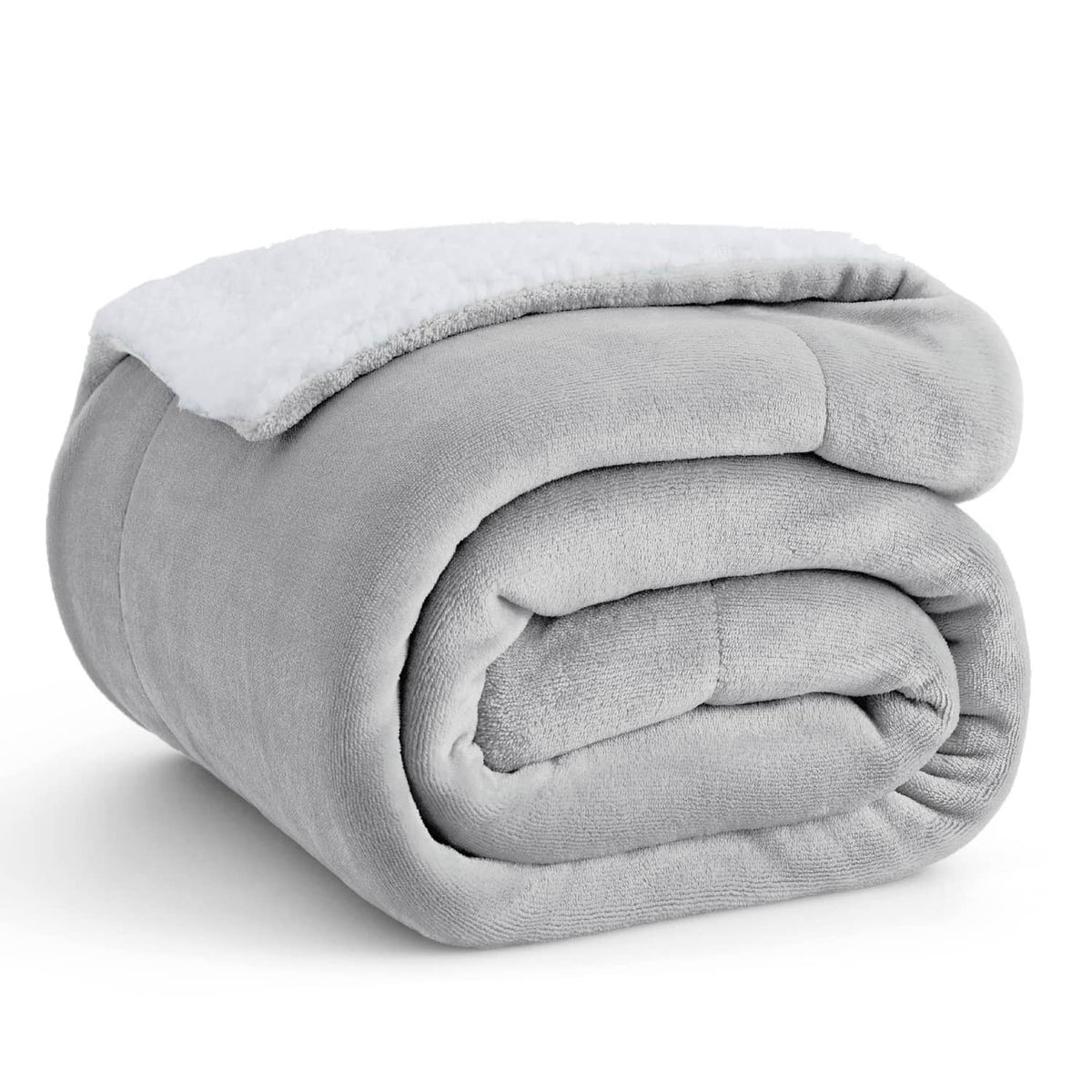Light grey sherpa fleece throw blanket, folded with soft textured lining visible