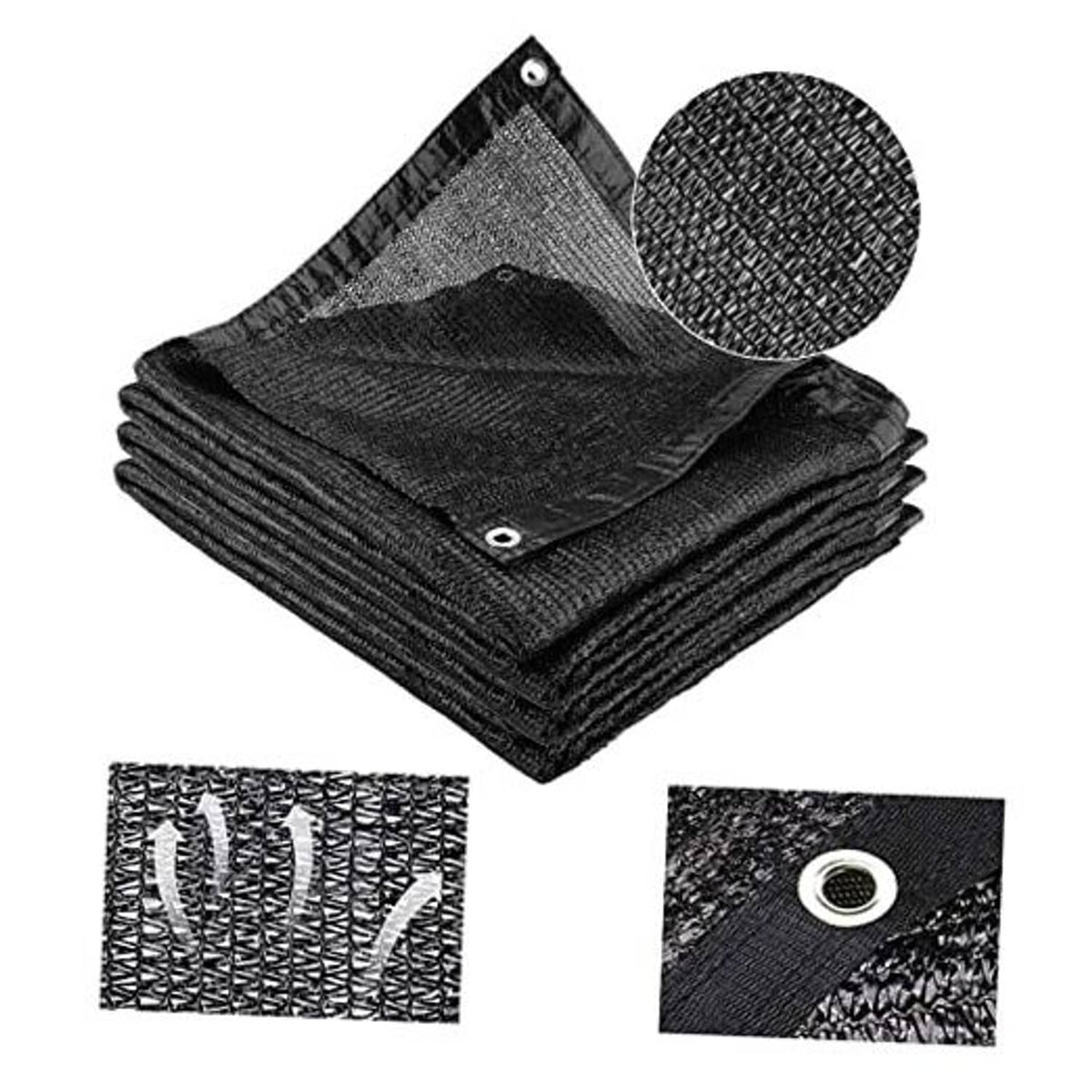 Black shade cloth roll folds with metal grommets for outdoor sun protection