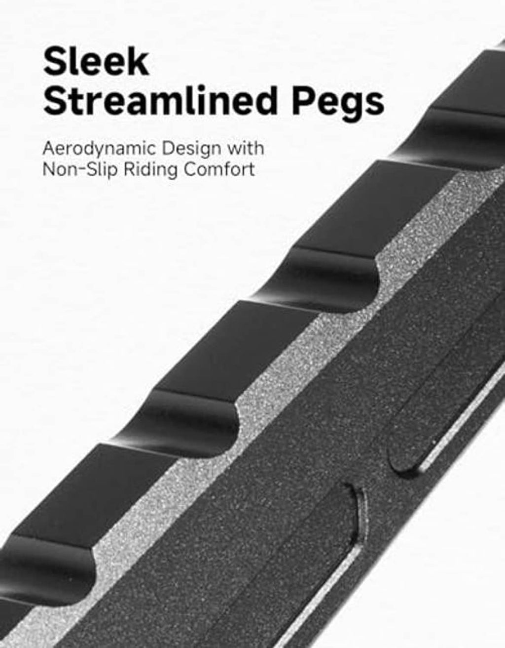 Black streamlined passenger footpeg with non-slip tread and raised side edges