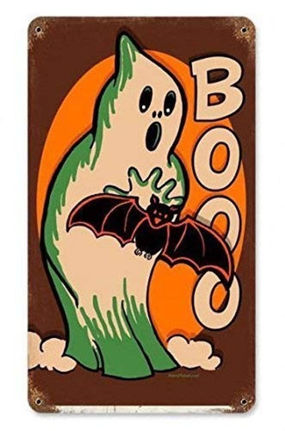 Vintage Halloween metal tin sign with cartoon ghost and BOO text