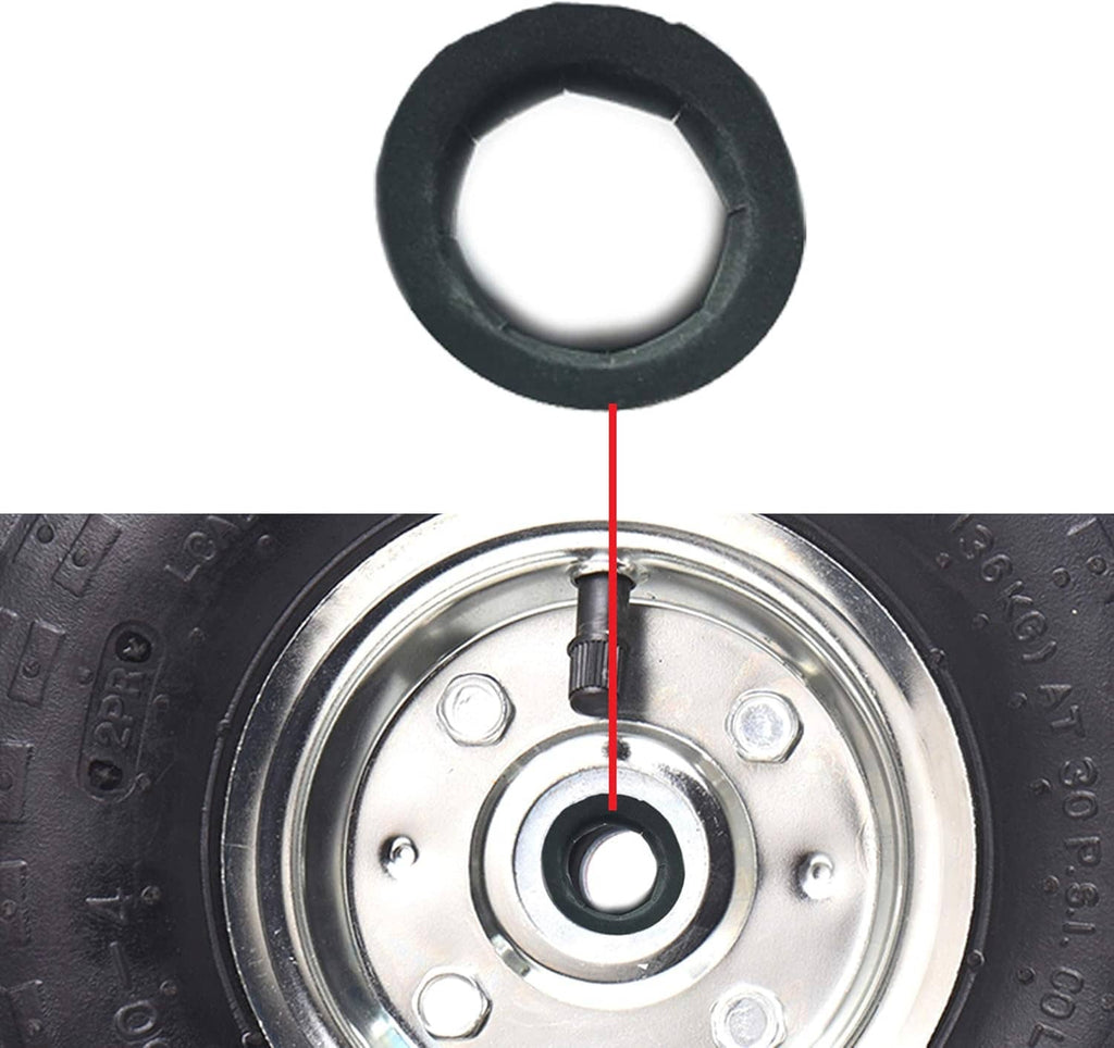 Black pushnut lock washer close-up, shown above a wheel hub with mounting holes
