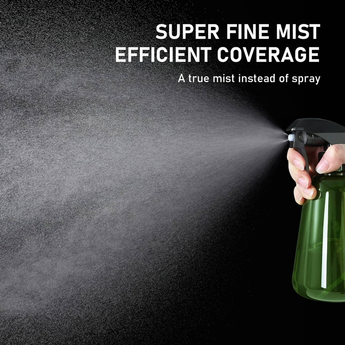 Green plant mist sprayer with black trigger nozzle creating a fine spray cloud