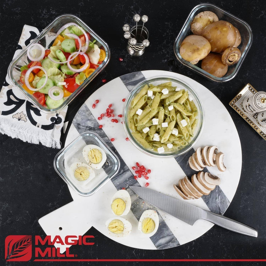 Borosilicate glass meal prep containers with lids, holding prepared vegetables