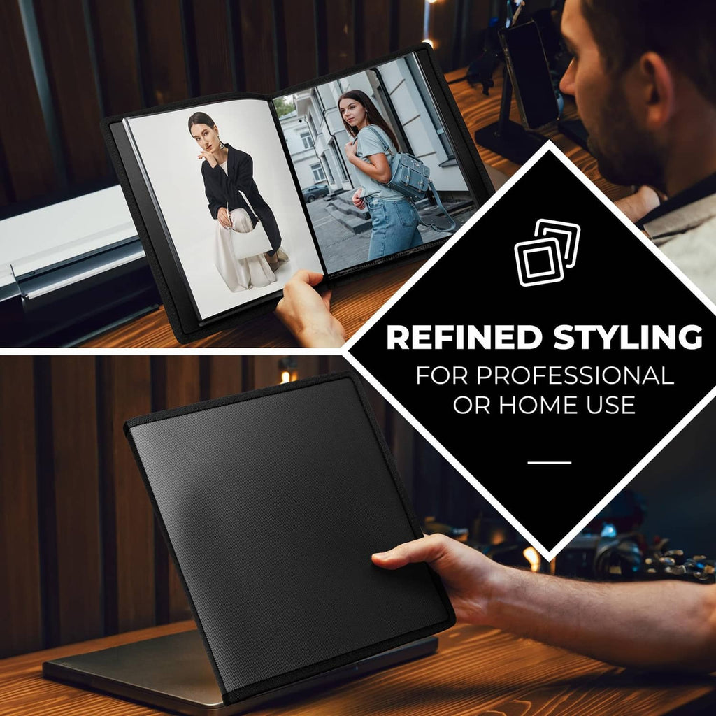 Black art portfolio folder with textured cover held open for viewing on a desk