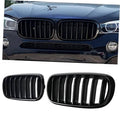 Front bumper kidney grille set with single vertical glossy black slats, chrome-free look.