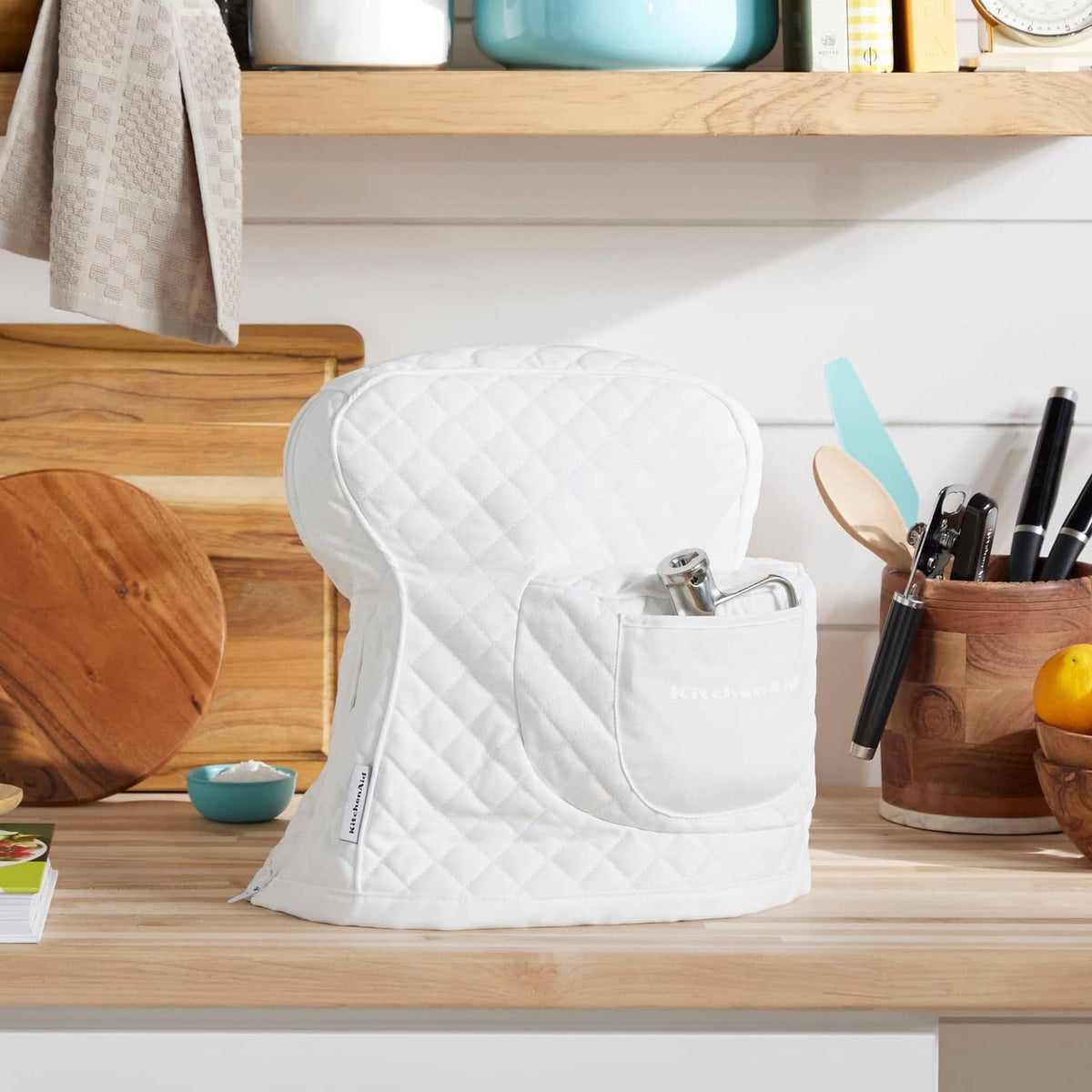 White quilted tilt-head stand mixer cover with front storage pocket