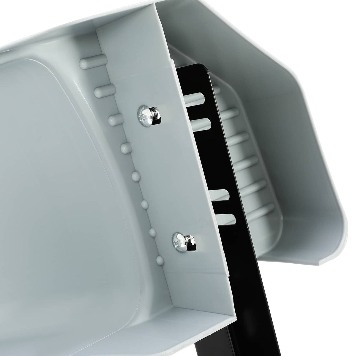 Close-up of light gray fender mounting hardware with black bracket and steel bolts