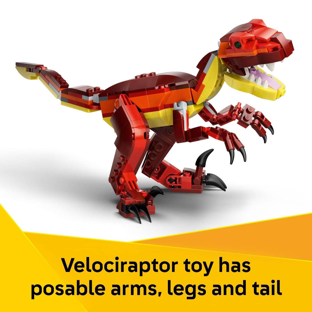 LEGO Creator velociraptor dinosaur model in red, yellow, and dark maroon with posable parts
